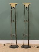 ORNATE STANDARD LAMPS - a pair, uplighters with two central glass shelves, 168cms H, 37cms diameter,