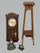 KIENZLE VINTAGE WALL CLOCK with silvered dial, 76cms H, 38cms W, 18cms D, an Arts & Crafts style oak