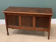 POLISHED OAK BLANKET BOX with a three panelled front, on block supports, 69cms H, 116cms W, 45cms D