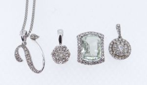 ASSORTED WHITE GOLD JEWELLERY comprising 9K white gold diamond chip ‘V’ pendant on 18ct white gold