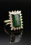 18CT GOLD GREEN TOURMALINE & DIAMOND CLUSTER RING, the central green tourmaline (13 x 8mms)