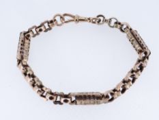 9CT GOLD TROMBONE & MIXED LINK CHAIN, 20cms long, 13.7gms Provenance: deceased estate