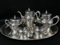 AMERICAN ELECTROPLATED FIVE-PIECE TEA SERVICE, W M Rogers, Connecticut, relief decorated with