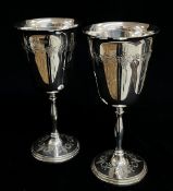 PAIR SILVER GOBLETS, maker CT, Birmingham 1976, fruiting vine garland decoration, tot app wt 12.5