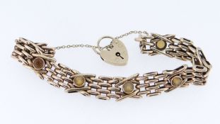 9CT GOLD BRICKWORK BRACELET, set with seven semi-precious stones, 18.7gms Provenance: deceased