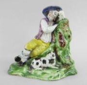 STAFFORDSHIRE PEARLWARE FIGURE OF SLEEPING BOY c. 1820