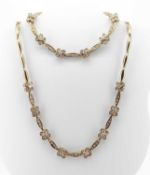 YELLOW GOLD DIAMOND SET SUITE OF JEWELLERY