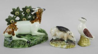 THREE ENGLISH POTTERY MODELS OF ANIMALS, c.1820-1850