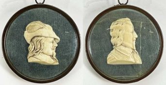 PAIR CARVED IVORY PORTRAIT MEDALLIONS, probably French, of King Charles I and Oliver Cromwell, in