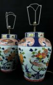 PAIR OF LARGE IMARI-STYLE PORCELAIN TABLE LAMPS, decorated in the Edo style with flowers below