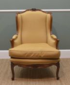 LOUIS XV-STYLE WINGBACK BERGERE ARMCHAIR with floral carved cresting rail, moulded sides and