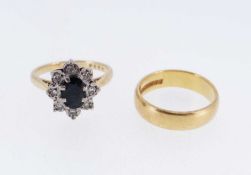 TWO GOLD RINGS comprising 18ct gold sapphire and diamond chip cluster ring, ring size L, 3.9gms,