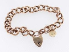 9CT GOLD CURB LINK BRACELET, having heart shaped padlock and 9ct gold circular pendant, 11.8gms