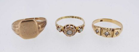 TWO 18CT GOLD GEM SET RINGS and a 9ct gold signet ring (worn / cut)