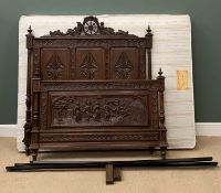 HEAVILY CARVED DUTCH BED having head and foot boards, metal rails and base by 'Seventh Heaven',