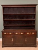 19th CENTURY OAK DRESSER, having a three shelf rack over a base of three drawers over three cupboard