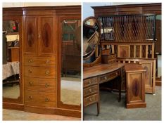 EDWARDIAN MAHOGANY BEDROOM FURNITURE comprising triple wardrobe with bow fronted central drawers and