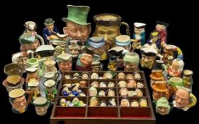 TOBY JUGS - a very large collection including Royal Doulton 'Famous Cornell Fluxex' Winston