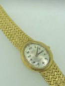 18CT GOLD LADY'S INTEGRAL BRACELET WRISTWATCH - the dial marked 'Bety Special', set with Arabic