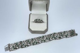 WHITE METAL DIAMOND & EMERALD ETERNITY RING, ring size L, 5.4gms, in a 'Colombian Emeralds