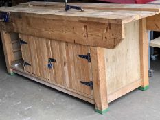WORKSHOP BENCH WITH VICE and lower twin cupboard doors, a substantial fine example, 93cms H,