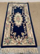CHINESE WASHED WOOLEN RUG, blue ground, 207 x 93cms