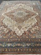 PERSIAN TYPE RUG - large example with multi-pattern border and a central diamond, 353 x 285cms