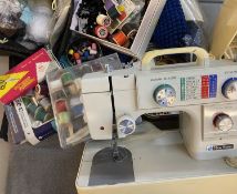 NEW HOME ELECTRIC SEWING MACHINE WITH FOOT PEDAL - in carry case, related cottons and needlework