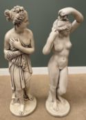 GARDEN STATUES - two reconstituted stoneware figurines of classical ladies, on circular bases,