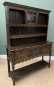 CIRCA 1930 OAK POTBOARD DRESSER, the three shelf rack having an upper glazed central door and the