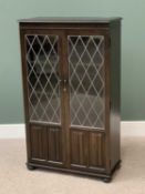 OAK LINENFOLD BOOKCASE CUPBOARD, the twin glazed doors with leaded glass panels, on bun feet, 132cms