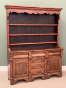 19th CENTURY MAHOGANY ANGLESEY DRESSER with three shelf rack, shaped cornice, the base with three