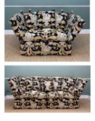 TWO LARGE KNOLE SOFAS, upholstered in black, gold and ivory classical styled fabric, large wood