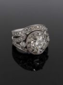 MODERN PLATINUM DIAMOND ENCRUSTED ENGAGEMENT RING & MATCHING WEDDING BAND, the central stone