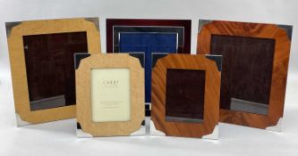 FIVE MODERN SILVER MOUNTED WOOD PHOTOGRAPH FRAMES, Carrs of Sheffield, birds eye maple, walnut and