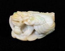 CHINESE JADEITE CARVING OF A BIXIE, recumbent on a leaf holding a lingzi stem in its mouth, base
