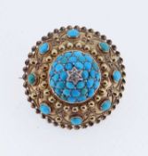 VICTORIAN ETRUSCAN SHIELD BROOCH having central diamond accent within a domed field of turquoise