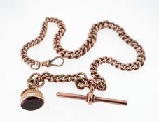 9CT GOLD ALBERT WATCH CHAIN, having graduated curb links, T-bar and gem set seal, believed amethyst,