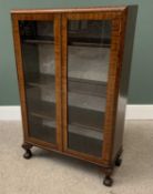 VINTAGE WALNUT CHINA DISPLAY CABINET having twin glazed doors and interior shelving, on ball and