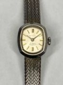 ERMATEN LADY'S 9CT WHITE GOLD BRACELET WRISTWATCH - 12 x 19mm case, the dial set with baton markers,