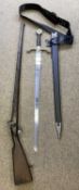 CIRCA 18TH CENTURY MUSKET, 143cms, and an ornamental sword and scabbard