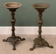 VICTORIAN CAST IRON BIRD BATHS, a pair, on tripod bases, 74cms H, 30cms diameter