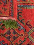 EASTERN WOOLLEN RUG - ground red with multi-border and abstract patterned, 162 x 95cms