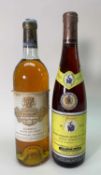 TWO BOTTLES OF FINE SWEET WINE comprising one bottle of 1983 Chateau Coutet, 1ere Cru Classé