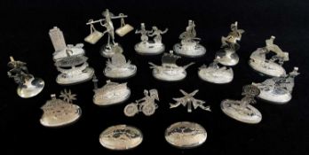SET OF FOURTEEN MALAY WHITE METAL PLACE OR MENU HOLDERS, two others similar and a figural table