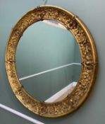 VICTORIAN PRESSED COPPER & GILDED CIRCULAR MIRROR, decoration of national flowers and Rococco