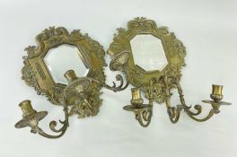 PAIR OF 19TH CENTURY BRASS GIRANDOLES, with beveled glass, triple scrolling candleholders, crowned