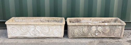 PAIR OF GARDEN TROUGHS, having foliate relief decorated bodies, 83cms wide