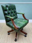 REPRODUCTION SWIVEL ARMCHAIR green leather button upholsteryComments: leather distressed and soiled
