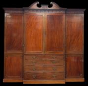 SUBSTANTIAL MAHOGANY ANTIQUE TRIPLE BREAK-FRONT WARDROBE circa 1900, centre two door linen press